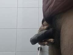 Indian man gets off solo in the bathroom with his ample fuck-stick